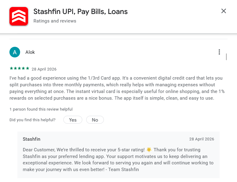 Screenshot of a Stashfin Google Play review by Alok describing the 1/3rd Card app instead of Stashfin, indicating a review-product mismatch.